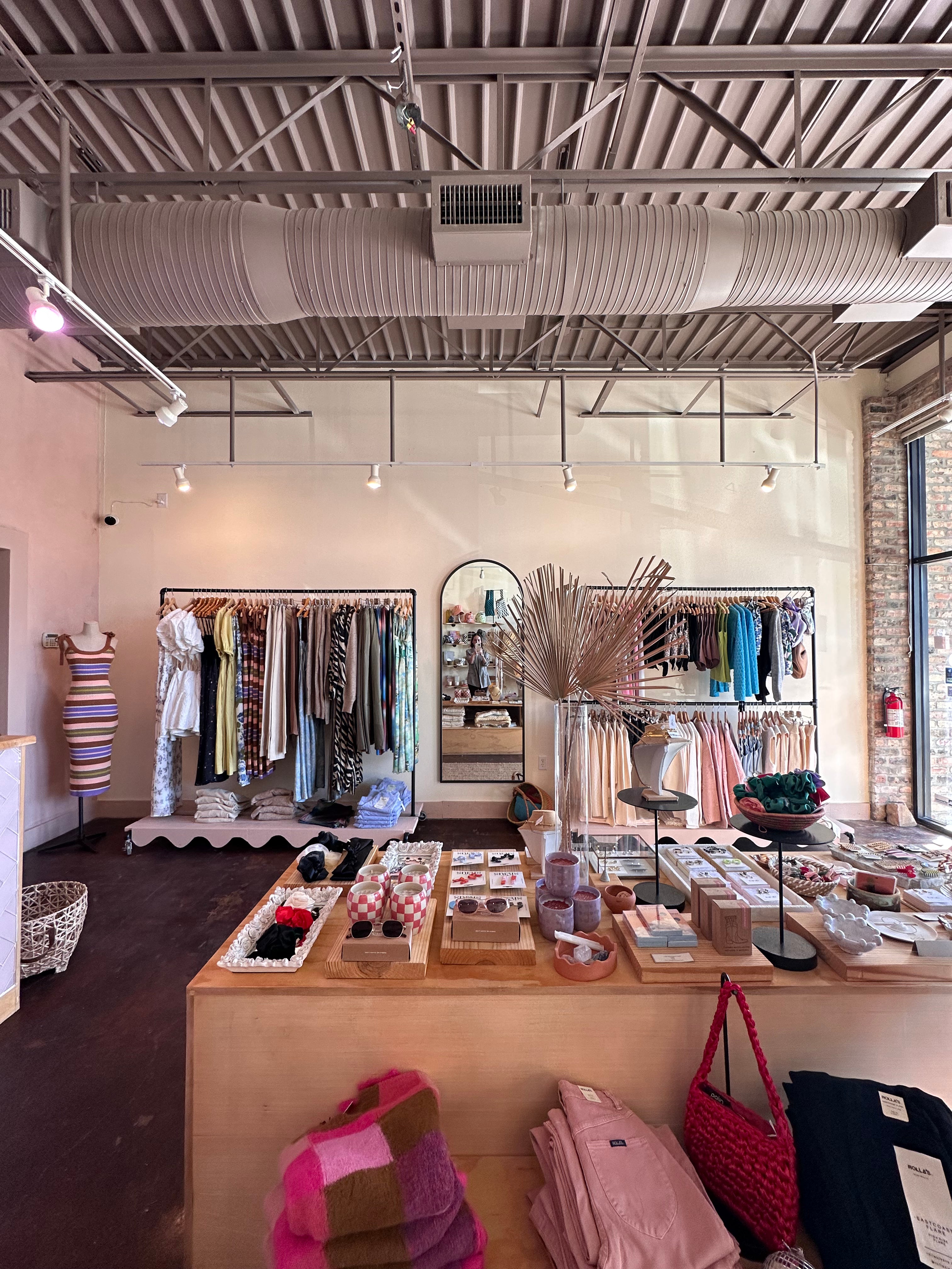 Store view of racks and curated accessories 